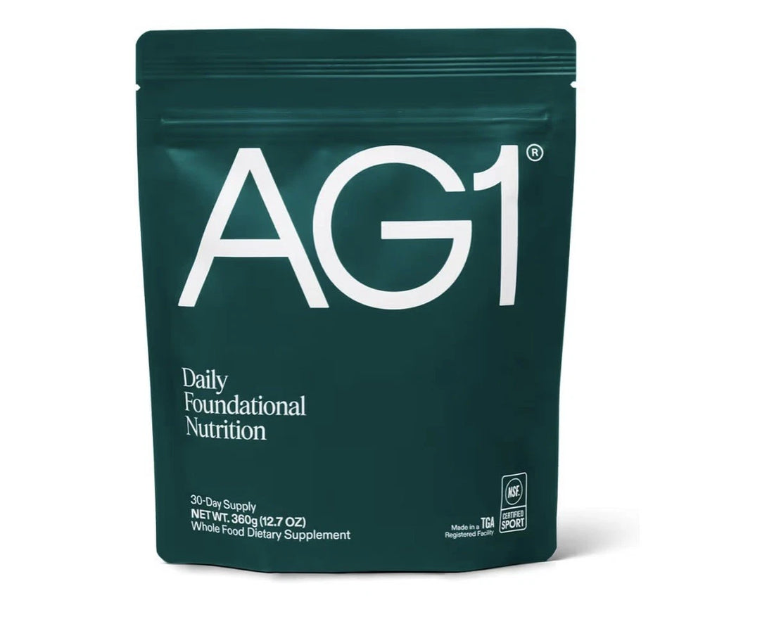 AG1 daily foundational nutrition package on a white background