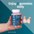Hand holding a bottle of WEEM supplements with text 'Enjoy 2 gummies daily' on a blue background
