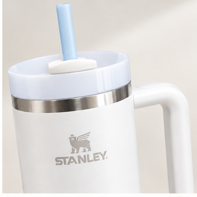 White Stanley Quencher H2.0 insulated tumbler with straw, reusable travel cup with handle
